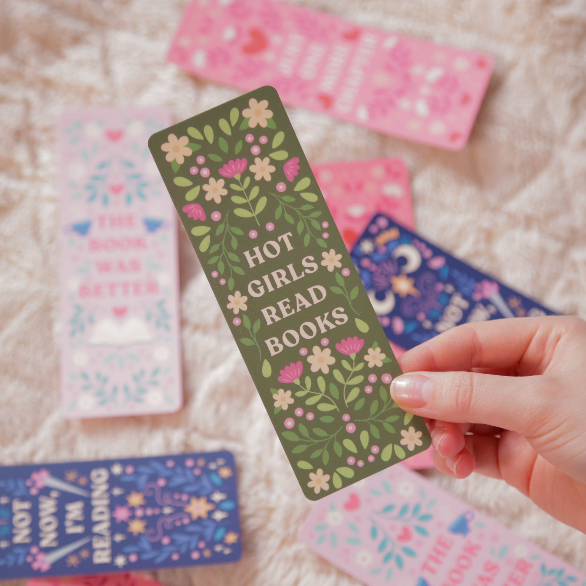 A photograph of a unique illustrated floral bookmark.