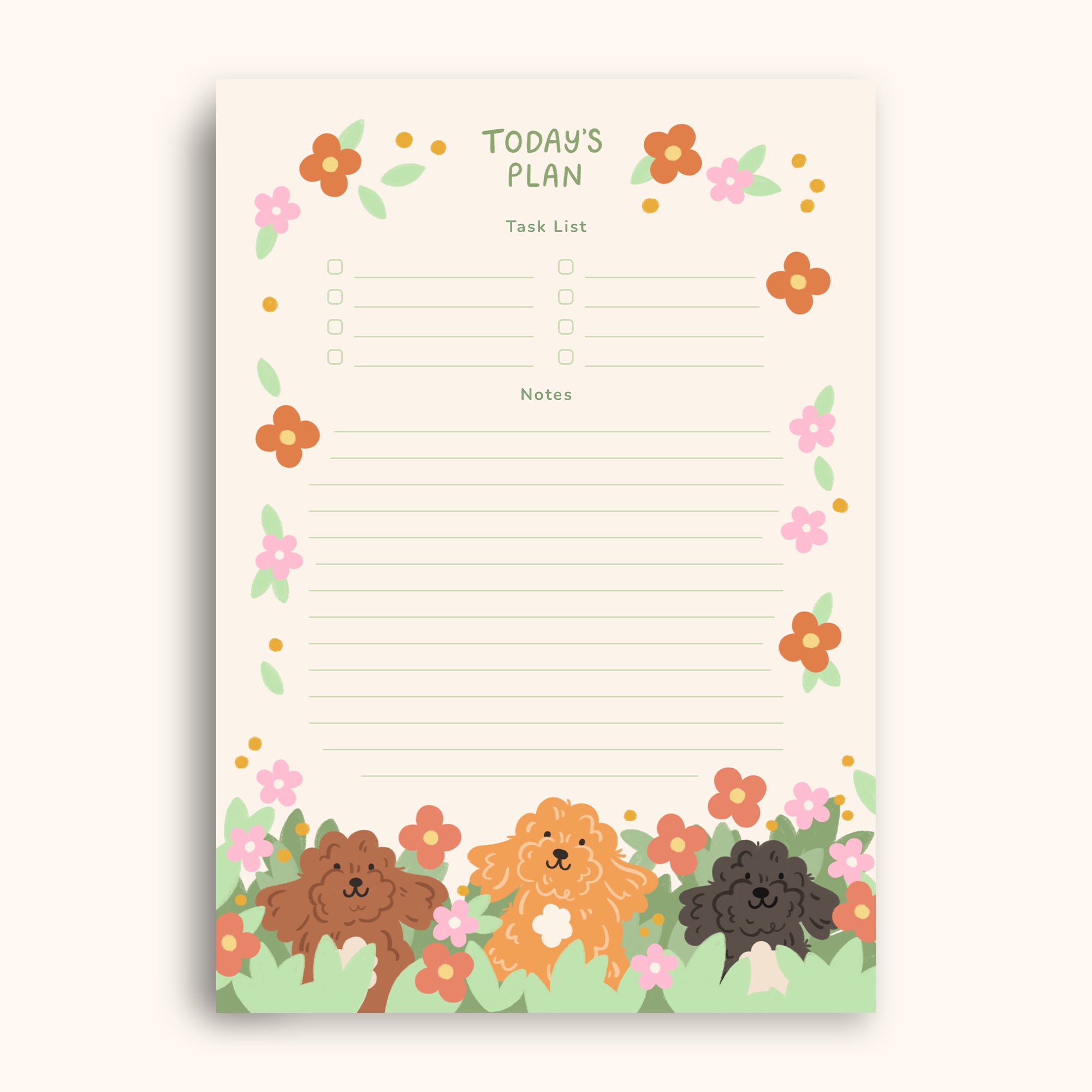 Notepad with cartoon dogs and floral design on a white background