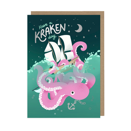 A birthday card featuring an illustration of a kraken and pirate ship and reads "have a kraken day". 