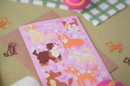 A close up photograph of a dog-themed birthday card. 